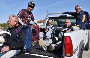 Skydivers in truck 5